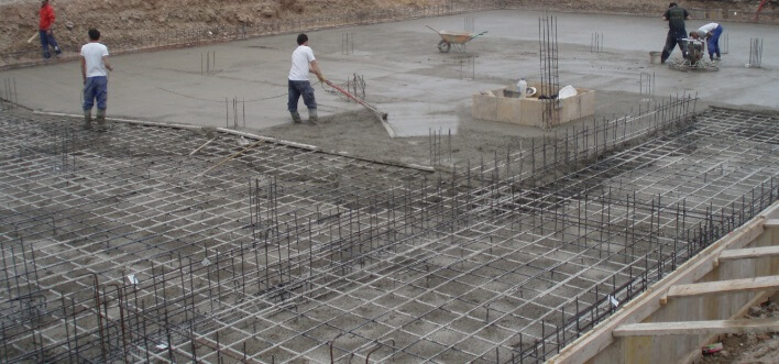Waterproofing below the water table in concrete slabs.